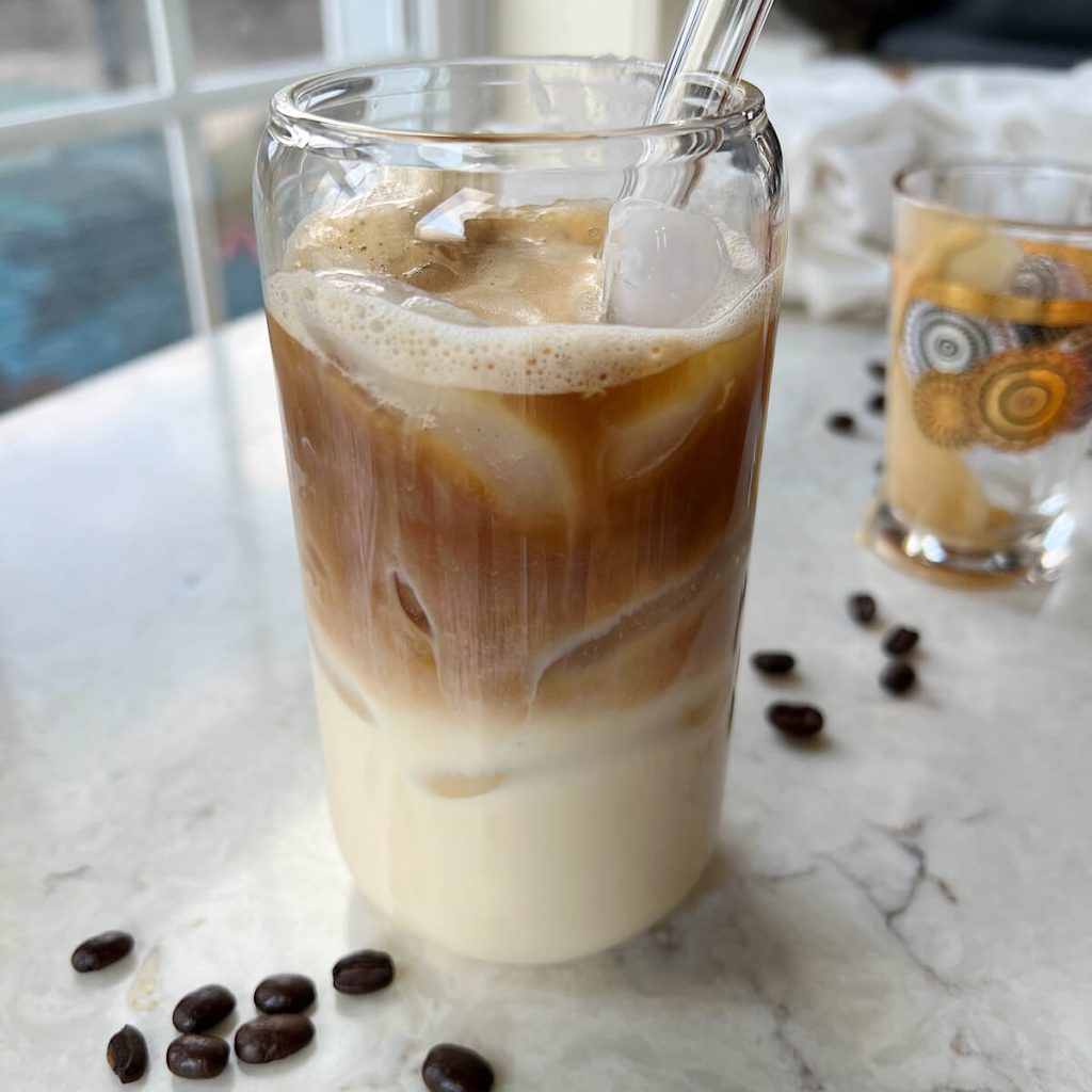 Image of an iced latte with a fresh and inviting background 